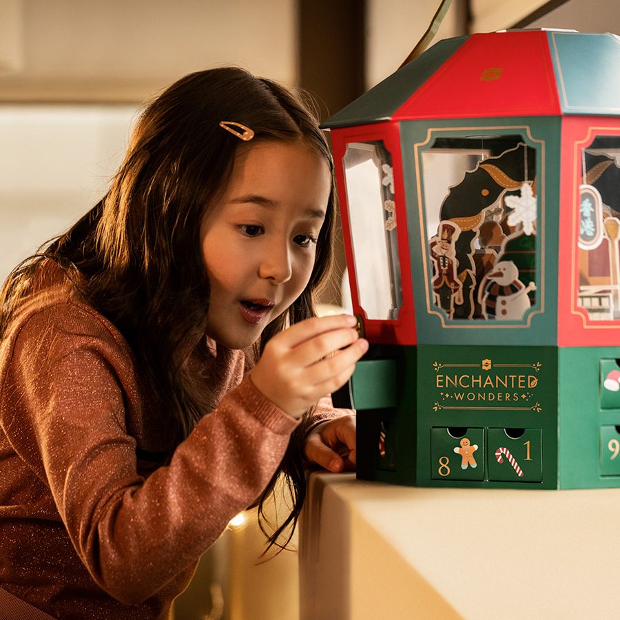 A child with a Christmas box at Island Shangri-La